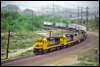Dash 8-40B 7420 leads TOFC down the South Track at Cajon, CA, 1994