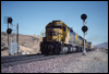 Westbound SD40 5004 splits the signals in Cajon Pass between Hesperia and Summit, CA, 1992