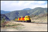 Kodachrome GP30 2752, GP39-2 3613 and a Yellowbonnet GP38 eastbound at Swarthout Canyon Road in Cajon Pass, CA, 1987