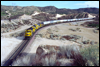 Class GP60 4000 on the point of a westbound TOFC near MP57 in Cajon Pass, CA, 1989