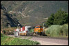 Double stacks in Cajon Pass approaching Swarthout Canyon Road pulled by Dash 9-44CW 4330, BNSF SD40-2 6785 and MRL SD45-2 301 in 2006