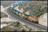 BNSF Dash 9-44CW 5264 leads sister GE 4433 and FURX SD40-2s 7930/7931/7282 approaching Summit, CA, 2006