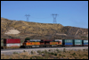 BNSF 5303 West meets eastbound stacks at Summit, CA, 2006