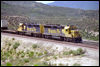GP40Xs 3800/3806 assist an eastbound intermodal approaching Summit, CA, 1993